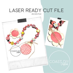 May include: Laser cut file for a wooden ladybug and flower garland. The garland is made of pink and white wooden beads with ladybug and flower charms. The ladybug charm is red with white polka dots. The flower charm is pink with a white center. The garland is tied with a brown twine.