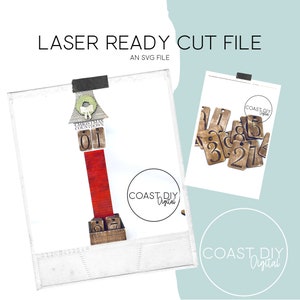 Può includere: Un calendario dell'avvento in legno con sfondo rosso e una ghirlanda in cima. I numeri 01 sono visualizzati sul calendario. Il calendario è circondato da una cornice bianca. L'immagine include anche un set di numeri in legno da 1 a 7, con sfondo marrone e numeri bianchi.