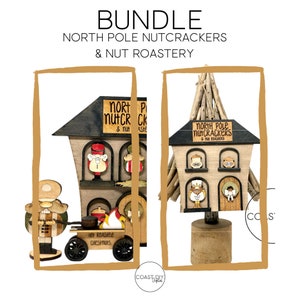 May include: A bundle of two wooden North Pole Nutcracker and Nut Roastery signs. The signs are painted in red, white, and brown with black lettering. The signs are decorated with small wooden figures of nutcrackers. One sign has a small wooden cart with a fire and the words "Hot Roasted Chesnuts".