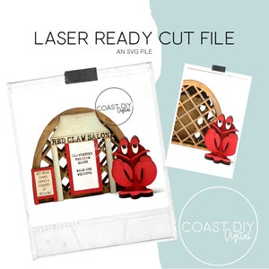 Puede incluir: Diseño de archivo de corte por láser para un salón de garras rojas con una mascota de langosta roja. El letrero dice "Red Claw Salon" con el texto "Claws, Veggies, Red Claw Salon, Walk-ins Welcome".