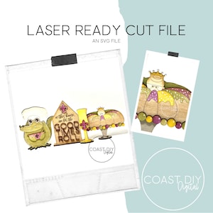 May include: Laser cut file design for a Mardi Gras themed sign with a king cake, a green alligator, and a sign that says "In this house, we bot the good times roll".