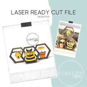 Könnte beinhalten: Laserschnitt-Datei-Design für eine Biene, eine Blume und eine Honigwabe in sechseckigen Rahmen. Das Design ist bereit, auf einem Laserschneider geschnitten zu werden. Die Datei ist eine SVG-Datei.