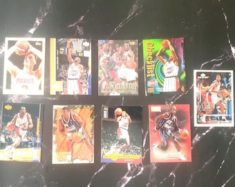 Lot of 9 Vintage Houston Rockets NBA Cards: Olajuwon, Drexler, Barkley (1980s-1990s)