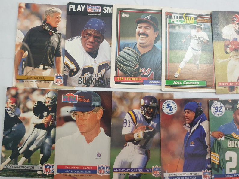 May include: A collection of 10 sports trading cards featuring various baseball players. The cards are in mint condition and feature colorful images of the players in action. The cards are from different years and feature different players from different teams.