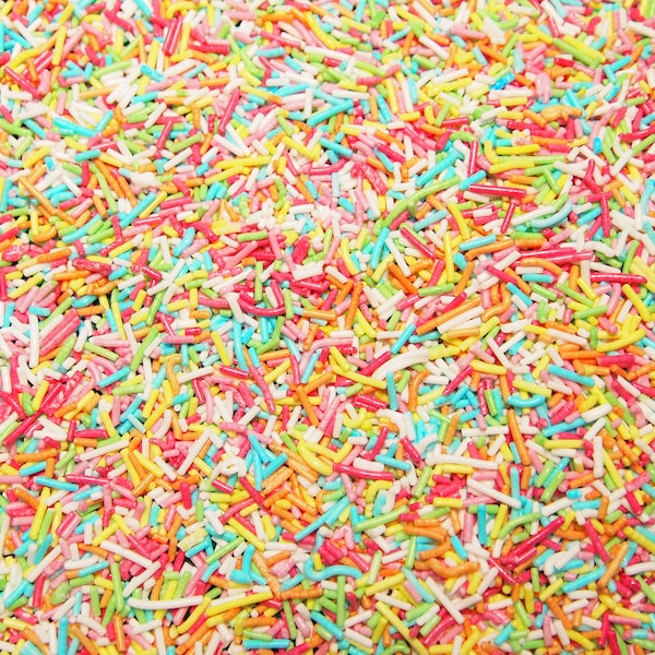 Multicoloured sugar strands glimmer sprinkles  confectionery shapes decoration