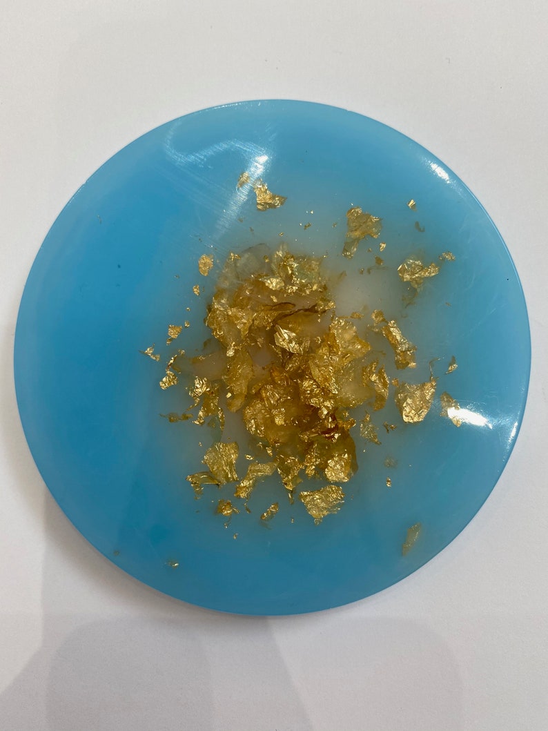 Light blue resin jewellery dish with gold foil centre