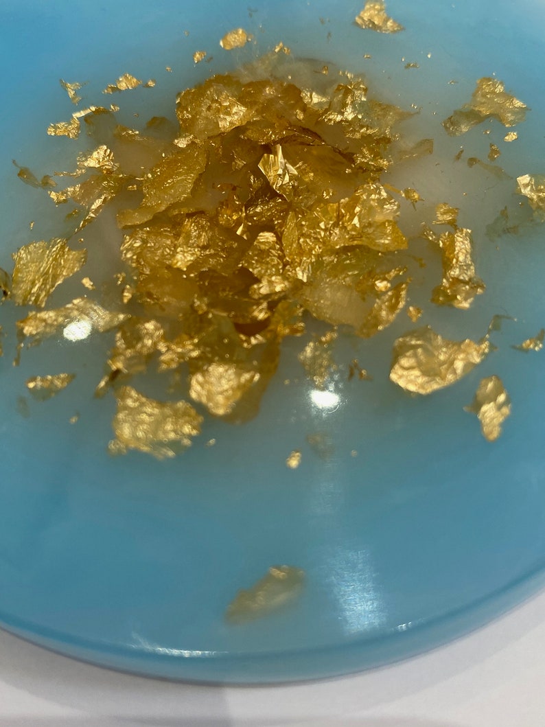 Light blue resin jewellery dish with gold foil centre