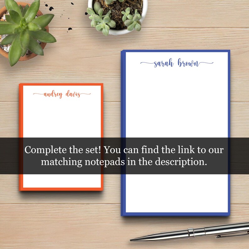 May include: Two blank notepad sets with orange and blue borders. The top of each notepad has a name written in cursive. The orange notepad says "andrey davis" and the blue notepad says "sarah brown".