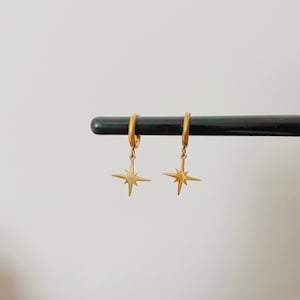 Gold north star hoop earrings, dainty hoop earrings, starburst pendant huggie hoops, minimalist gift for her, celestial charm earrings