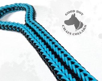 May include: A black and turquoise paracord chain dog collar. The collar is made of two strands of paracord, one black and one turquoise, that are woven together. The collar is shown on a white background. The text "GOOD BOY CHAIN COLLARS" is visible in the upper right corner of the image.