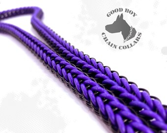 May include: A purple and black braided chain collar with the text "GOOD BOY CHAIN COLLARS" in a circle.