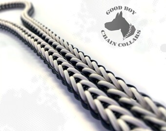 May include: Black and white braided dog collar with the text "GOOD BOY CHAIN COLLARS" in a circle.