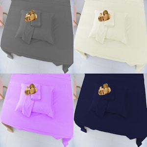 May include: Four different colored fitted sheets with pillowcases and a decorative gold accent. The sheets are in gray, cream, purple, and navy blue.