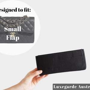 May include: Black felt bag insert designed to fit a Chanel Small Flap bag. The insert is shown in a hand, with the brand name "Luxegarde Australia" printed below.