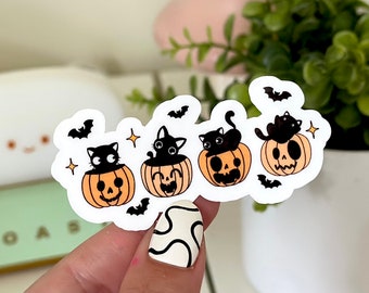 May include: Four black cats are sitting inside orange jack-o'-lantern pumpkins with bats and stars around them.