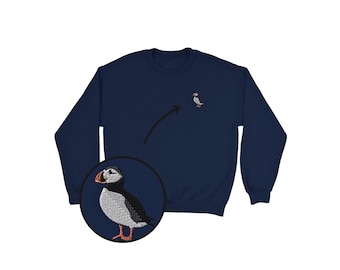 Bluza z haftowanym motywem maskonura atlantyckiego: klasyczna, unisexowa, z okrągłym dekoltem