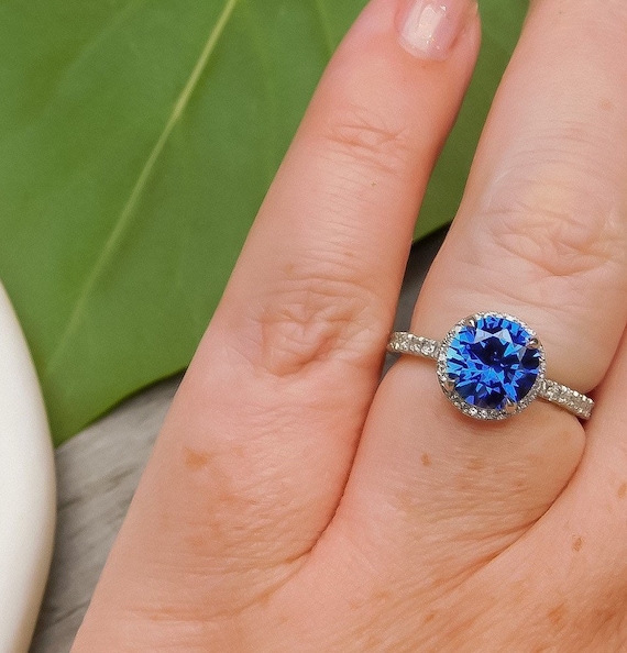 Estate Sapphire Ring with Diamond Halo in Platinum