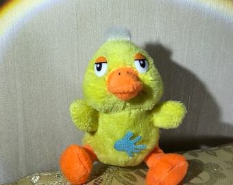 Peluche vintage des années 90 en forme de canard jaune