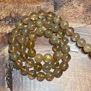 Cuentas de cuarzo rutilado natural de oro de alta calidad para joyería y manualidades. Redondas: 6 mm, 7-7,5 mm, 8 mm, 10 mm.