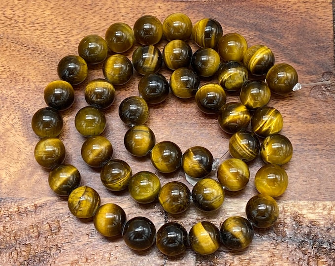 View Tiger Eye Beads by TheSereneSloth on Etsy