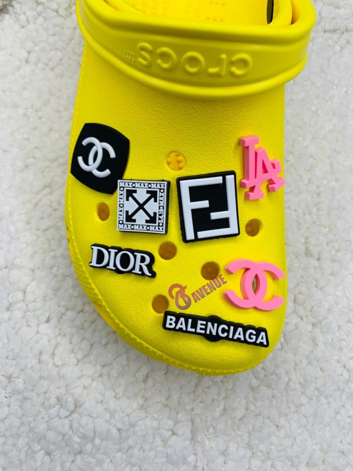 what stores sell charms for crocs