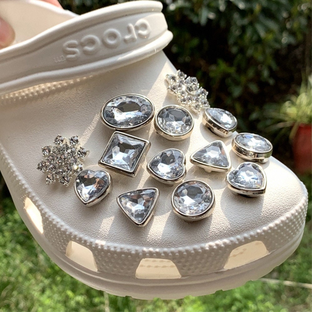 what stores sell charms for crocs