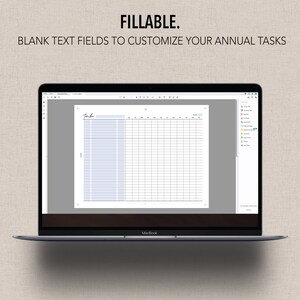 May include: A screenshot of a laptop displaying a blank annual task planner template. The template has a light blue background with black grid lines and text fields for entering tasks. The title of the template is "Tasks".