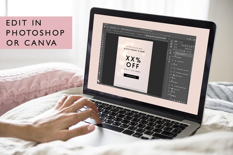 May include: A laptop screen showing a Black Friday promotional graphic. The design is light pink and black, with the text "BLACK FRIDAY IS HERE" and "XX% OFF". The words "EDIT IN PHOTOSHOP OR CANVA" are in a pink box. A hand is typing.