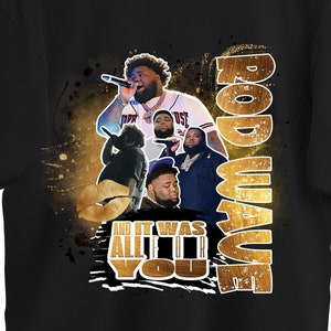 May include: Black t-shirt with a gold graphic of Rod Wave and the text "And It Was All For You".