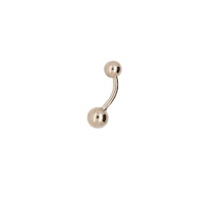 May include: A silver belly button ring with two round balls.