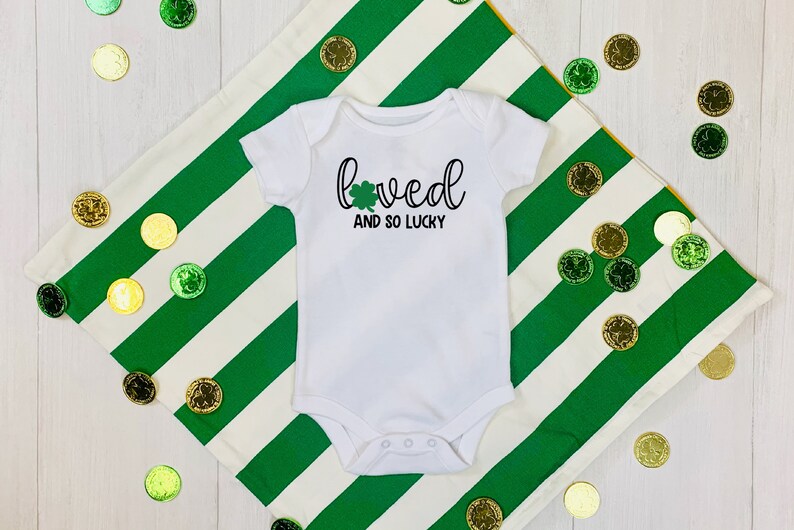 St Patty/'s Day Onesie Cute Holiday Onesie Lucky Baby Onesie Loved And So Lucky St Patrick/'s Day Gerber Baby Onesie