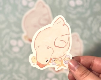 May include: A sticker of a yellow chick with three smaller chicks, all with closed eyes, and a white background.