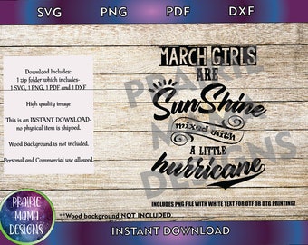May include: Digital download graphic design featuring a wood background with the text "March Girls Are Sunshine Mixed With A Little Hurricane". The design is in black text with a white background. The text "Includes PNG file with white text for DTF or DTG printing!" is also included in the image.