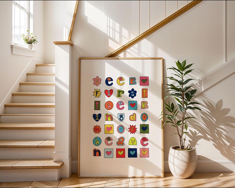 May include: A colourful alphabet print with each letter surrounded by a different design, including hearts, stars, flowers, and geometric shapes. The letters are in a variety of colours, including red, blue, green, yellow, and orange.