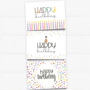 May include: Three printable birthday cards with different designs. The first card has a row of colorful candles with the text "HAPPY birthday". The second card has a party hat and the text "HAPPY birthday". The third card has a colorful confetti pattern and the text "happy birthday".