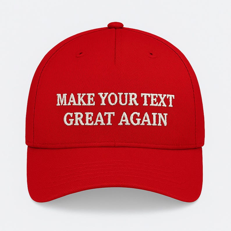 May include: A vibrant red baseball cap with a curved peak. The cap has white embroidered text that reads "MAKE YOUR TEXT GREAT AGAIN". The hat is a classic six-panel design with an adjustable strap.