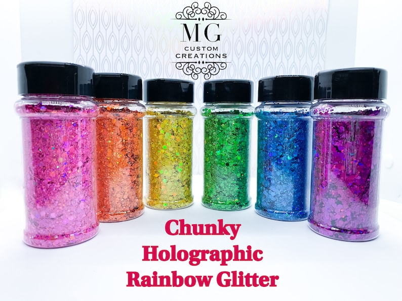 May include: Six jars of chunky holographic rainbow glitter. The jars are clear and have black lids. The glitter is in a variety of colors, including pink, orange, yellow, green, blue, and purple.