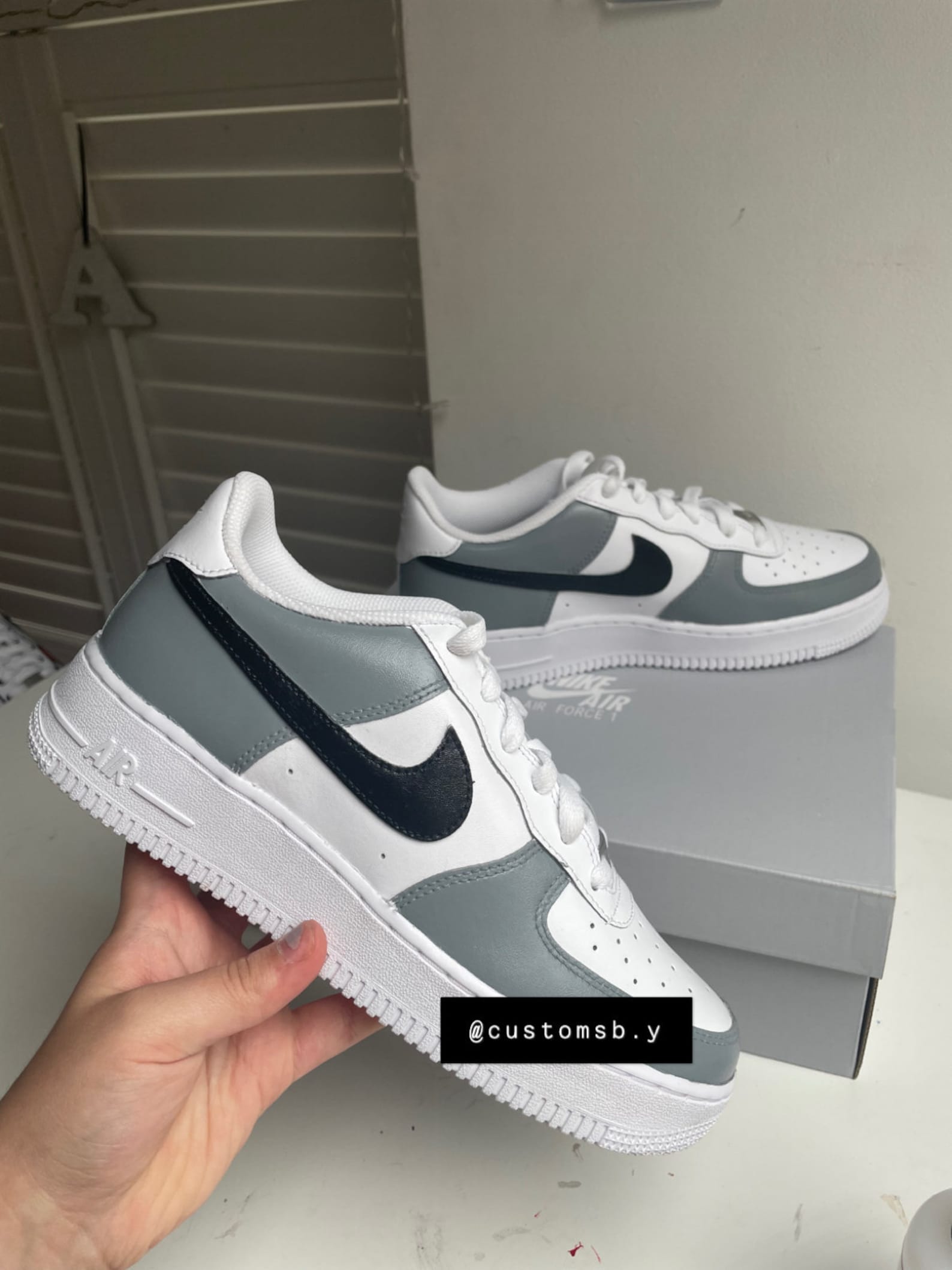 black and grey air force 1 low