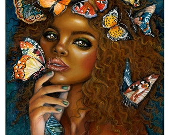 May include: A woman with dark brown curly hair has butterflies of various colors and patterns in her hair. She is looking at the viewer with a soft expression. A butterfly is resting on her finger.