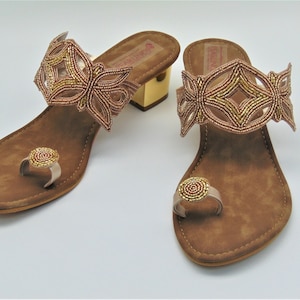 Rose gold toe ring wedge heels with embroidered rose gold beads on a petal design strap