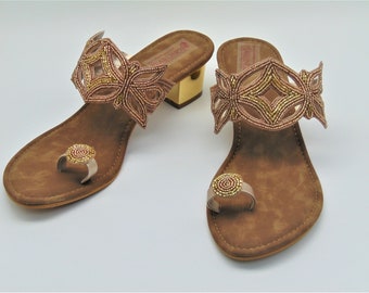 Rose gold toe ring wedge heels with embroidered rose gold beads on a petal design strap