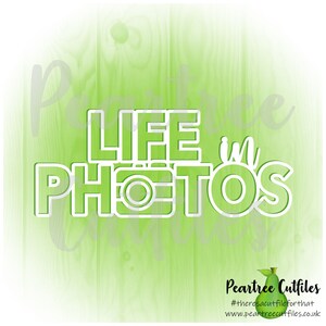 May include: White text on a green background reads "Life in Photos" with a stylized camera graphic in the middle of the word "Photos".