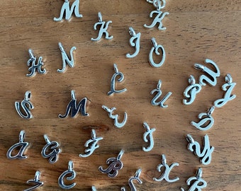 Letters to personalize your chain.   Please enquiries whether still in stock . Thanks!