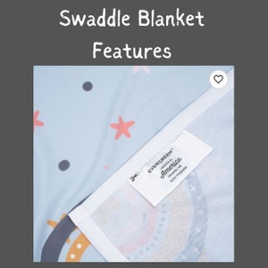 May include: A blue swaddle blanket with a white border and a white label that says "EVERGREEN PRINTED IN America Phoenix, AZ 100% Polyester". The blanket has a colorful rainbow design and a pattern of stars and dots.