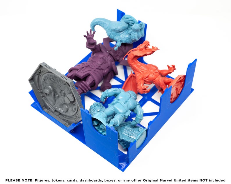 May include: Blue plastic organizer with compartments for storing miniature figures. The organizer contains five figures: a gray figure, a purple figure, a blue figure, a red figure, and a light blue figure.