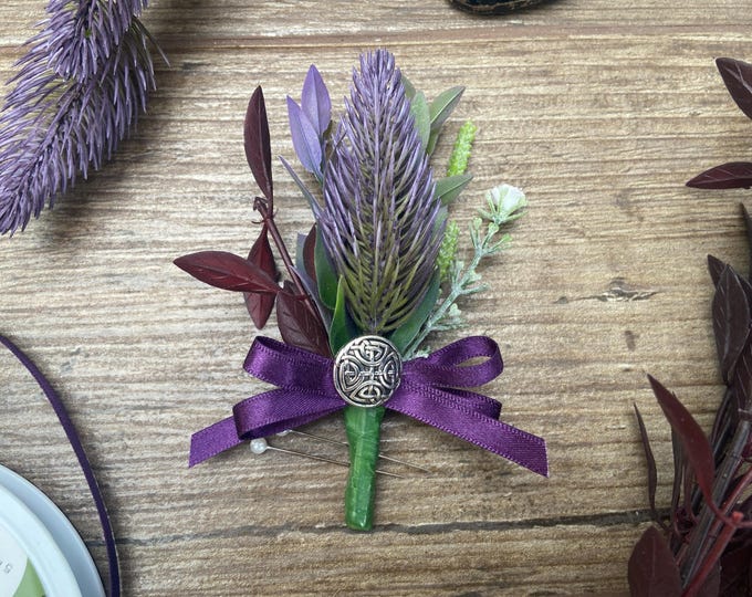 Featured listing image: Artificial/Faux Purple Thistle Wedding Buttonhole, (Round Celtic Charm), Blackberry Bow. Comes With Presentation Box.