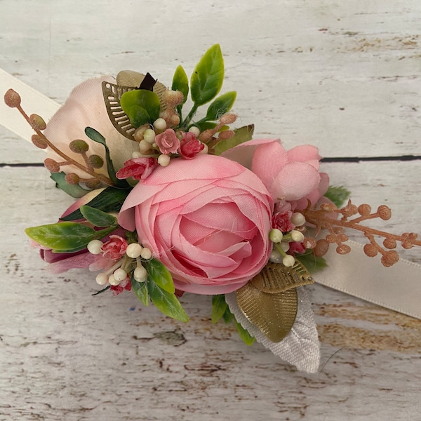 Ladies Floral Artificial Faux Soft Pink Ranunculus and Double Rose Wrist Corsage, Made On A Pearl Satin Ribbon. Comes In A Presentation Box.