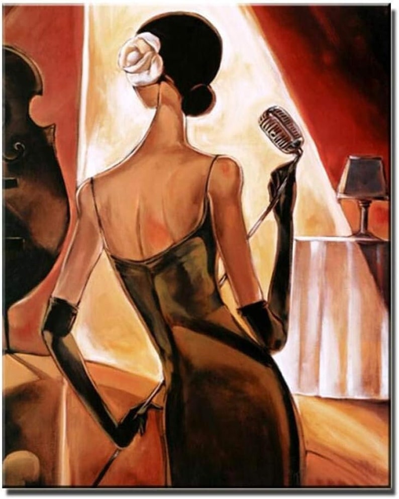 May include: A woman in a black dress and gloves stands in front of a microphone, with a spotlight shining on her. The background is a warm red and orange color.