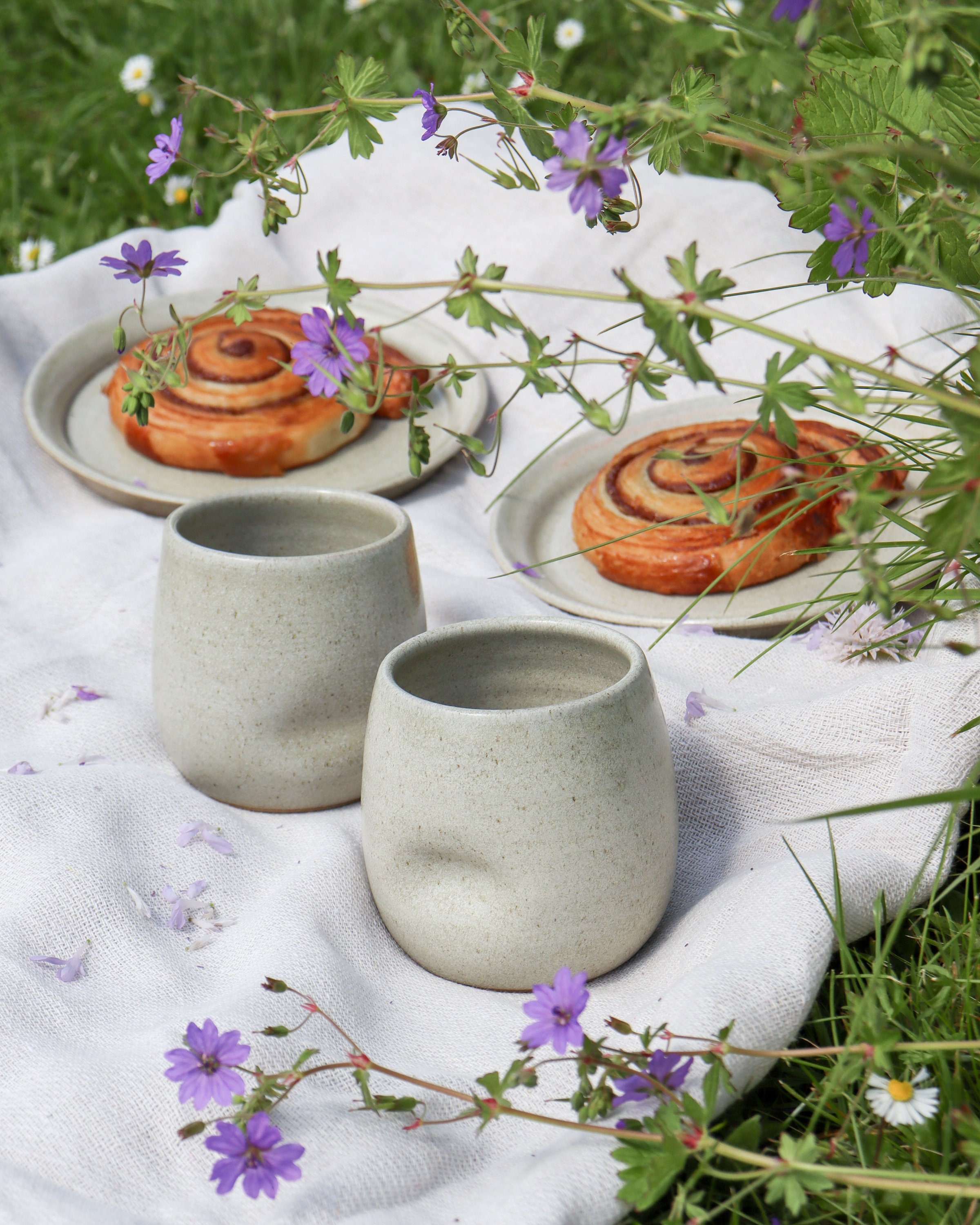 Hand made tumbler  in off white flecked glaze, handmade in ceramic stoneware pottery cup