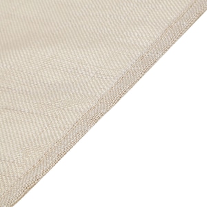 May include: Close-up of a beige fabric with a textured weave. The fabric has a subtle sheen and a delicate, stitched edge.